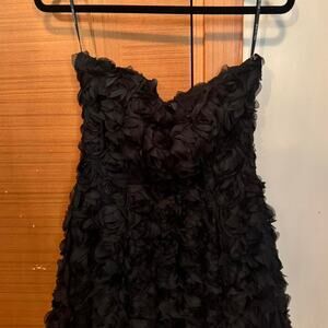 Strapless mini dress with rose shaped ruffles